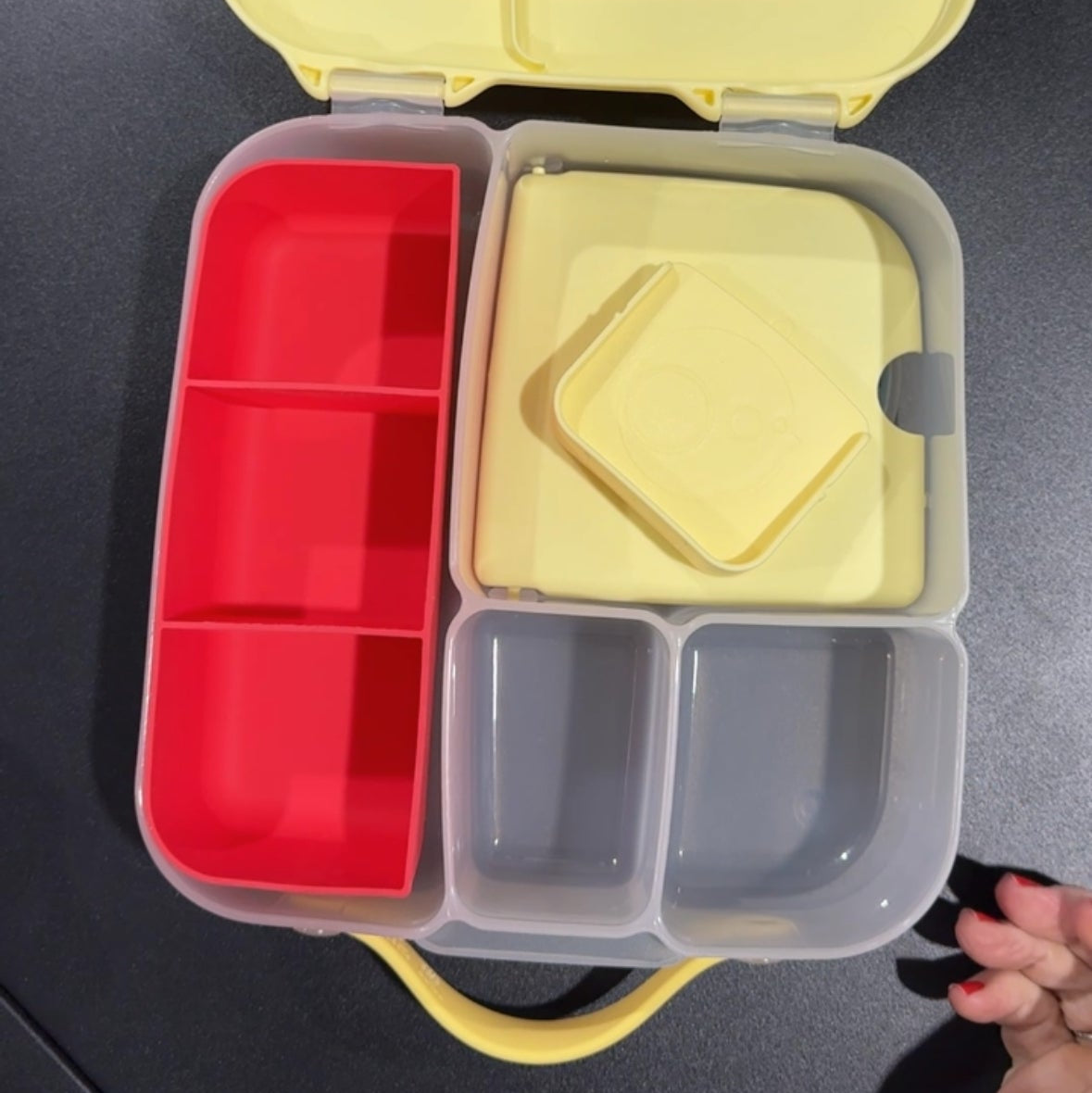 viral red silicone feast tray in bbox lunch box