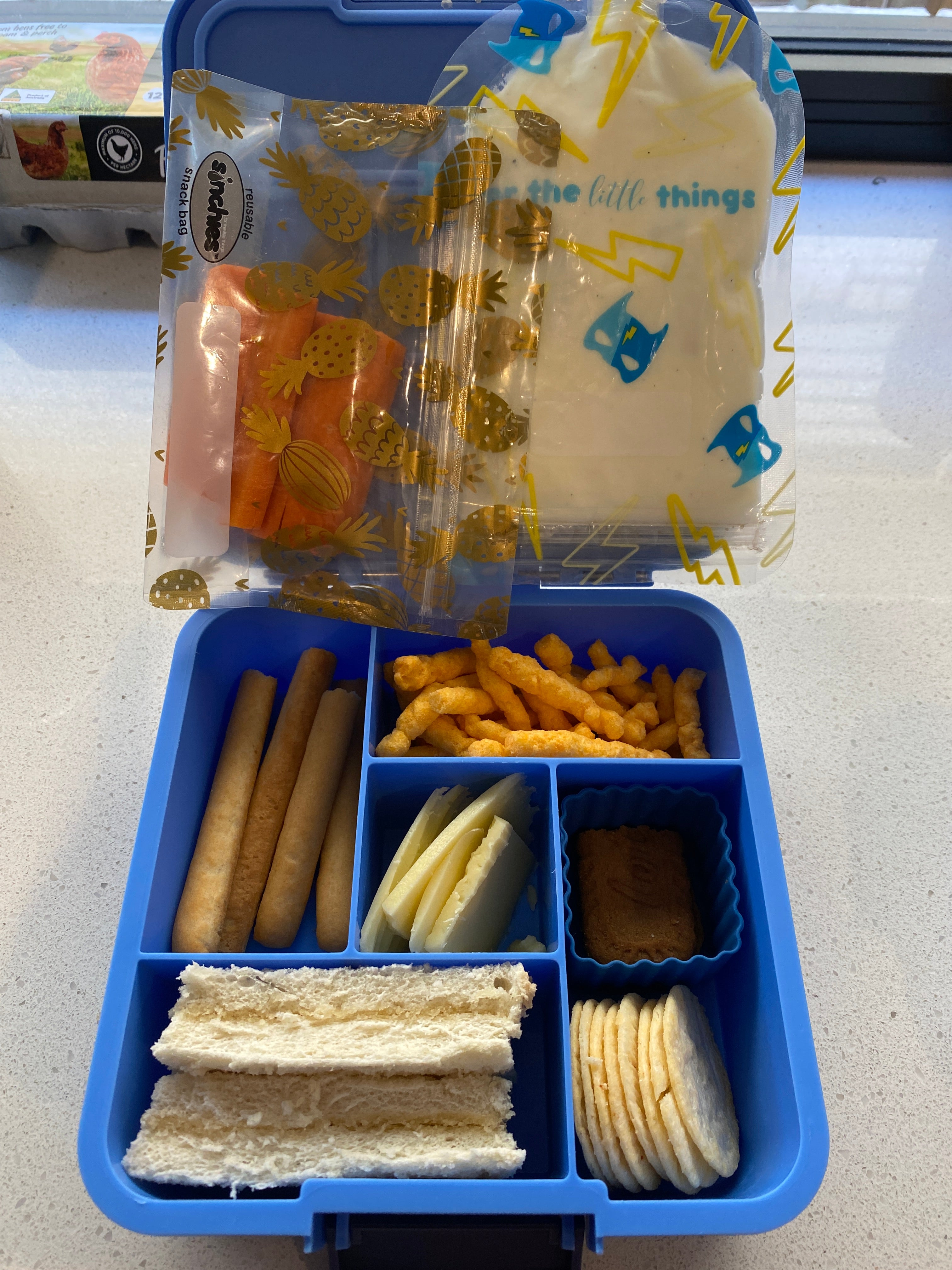 Lunch box and reusable yoghurt pouch