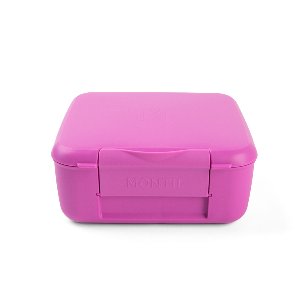 Pink lunch box with 'MONTII' branding on a white background