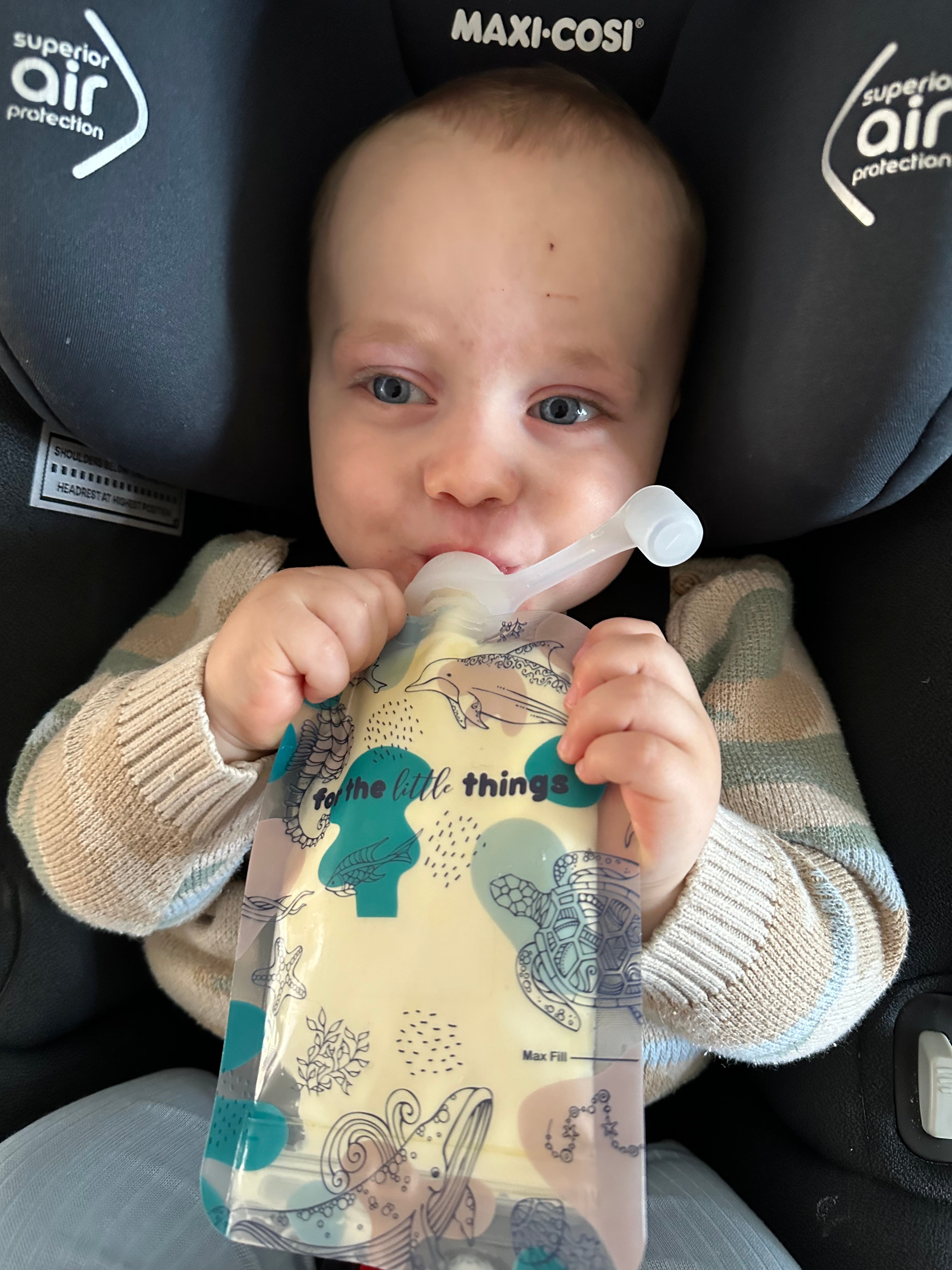 Baby drinking yoghurt