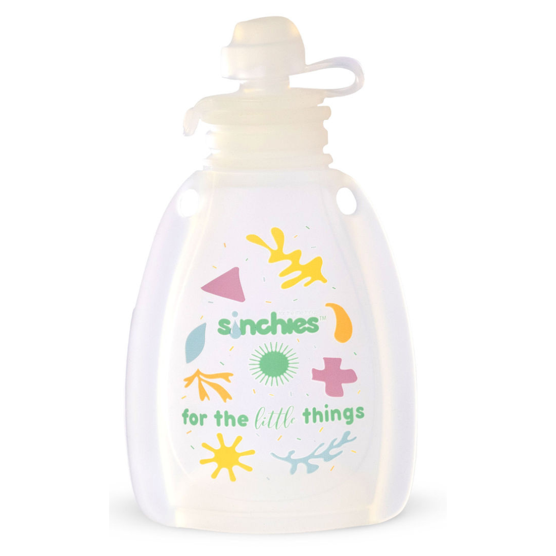 Clear white silicone food pouch with colorful designs and text on a white background