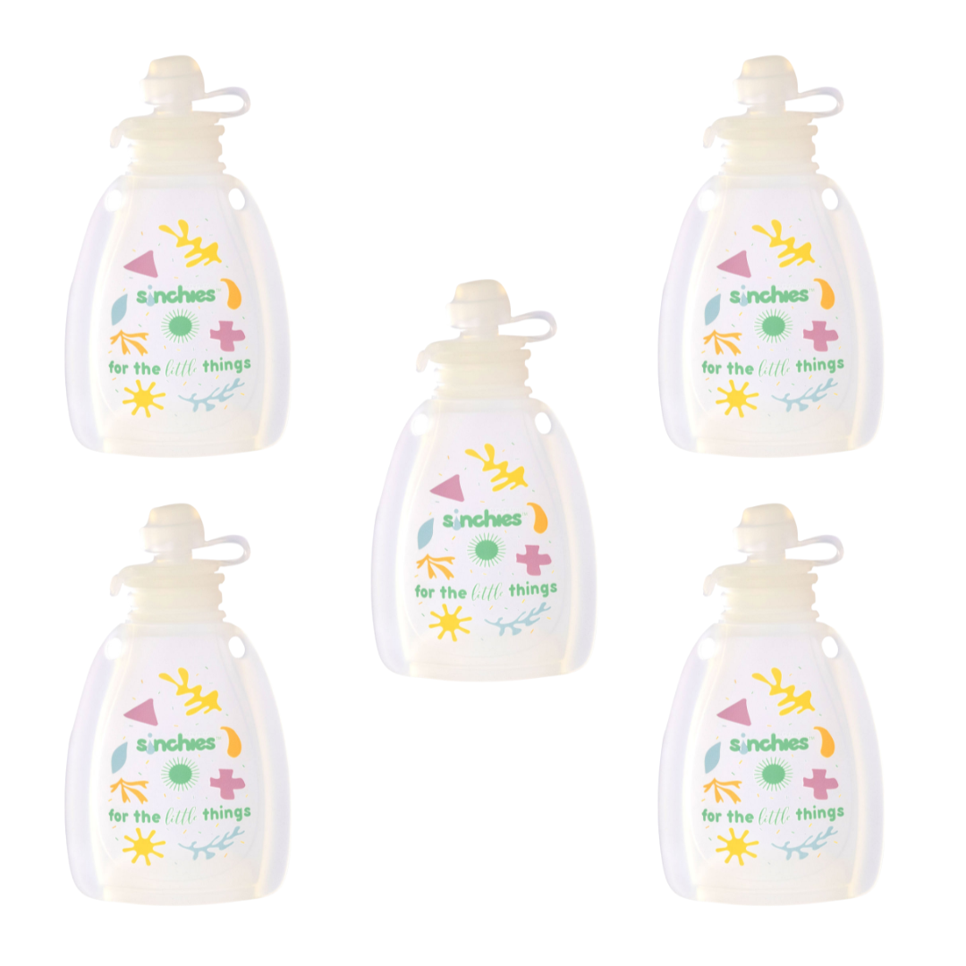 five white silicone food pouches